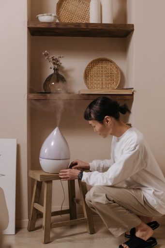 woman using humidifier